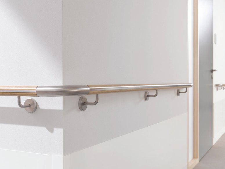 Wooden handrail with 90° arched supports and stainless steel end bend