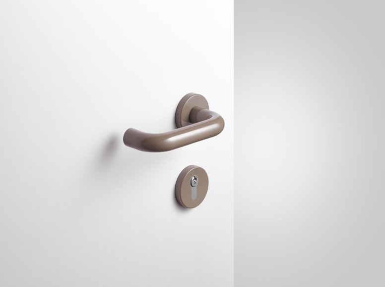 Lever handle with key rosette in the colour umbra made of polyamide