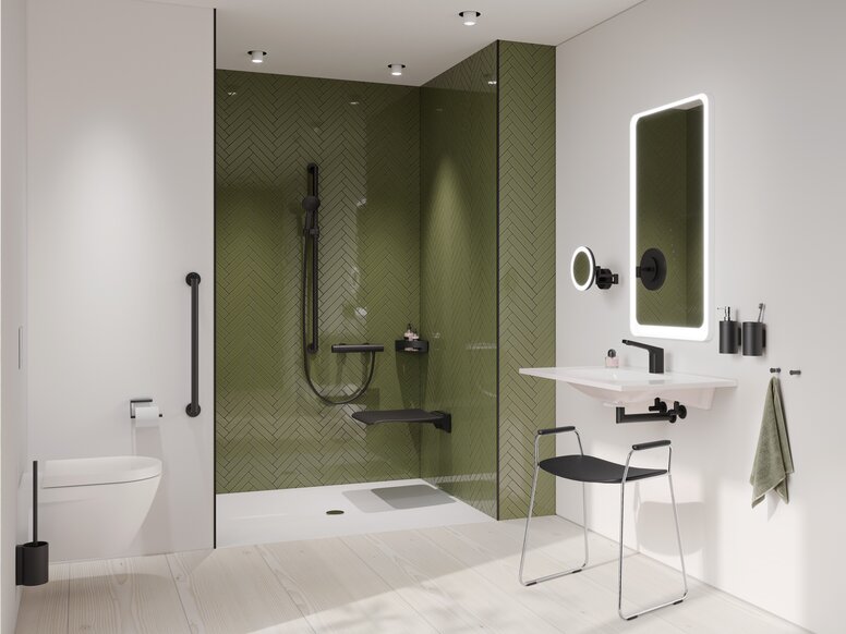 Salle de bain avec lavabo, espace douche et WC