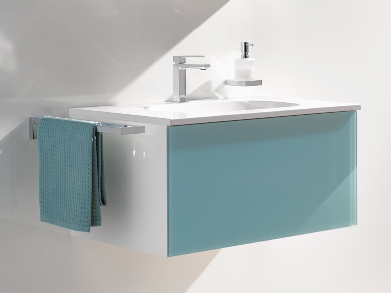 Mirror cabinet and washbasin in the color aqua blue