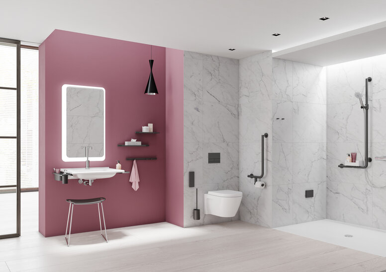 Barrier-free bathroom with washbasin, shower area and WC equipped with accessories in matt black