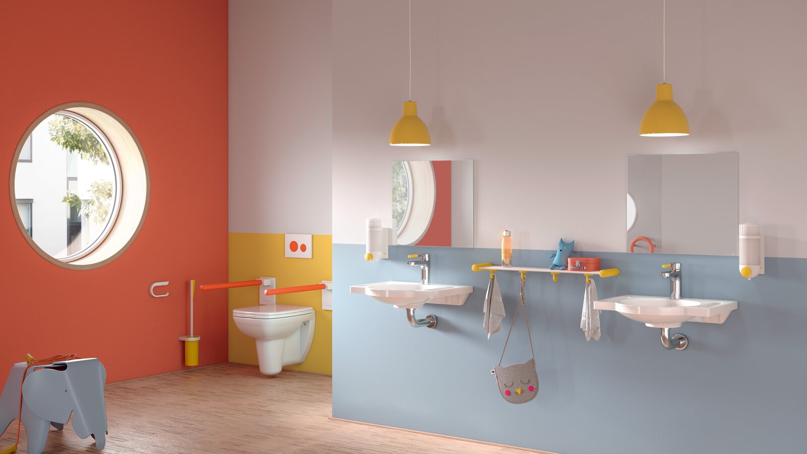 Salle de bain du jardin d'enfants avec des équipements sanitaires colorés et adaptés aux enfants