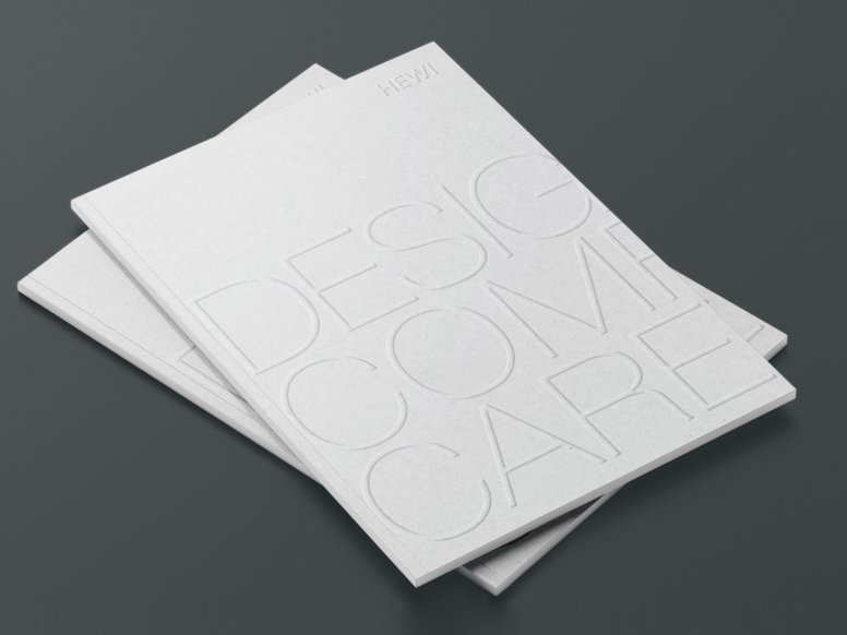 Two stacked brochures with the inscription Design Comfort Care