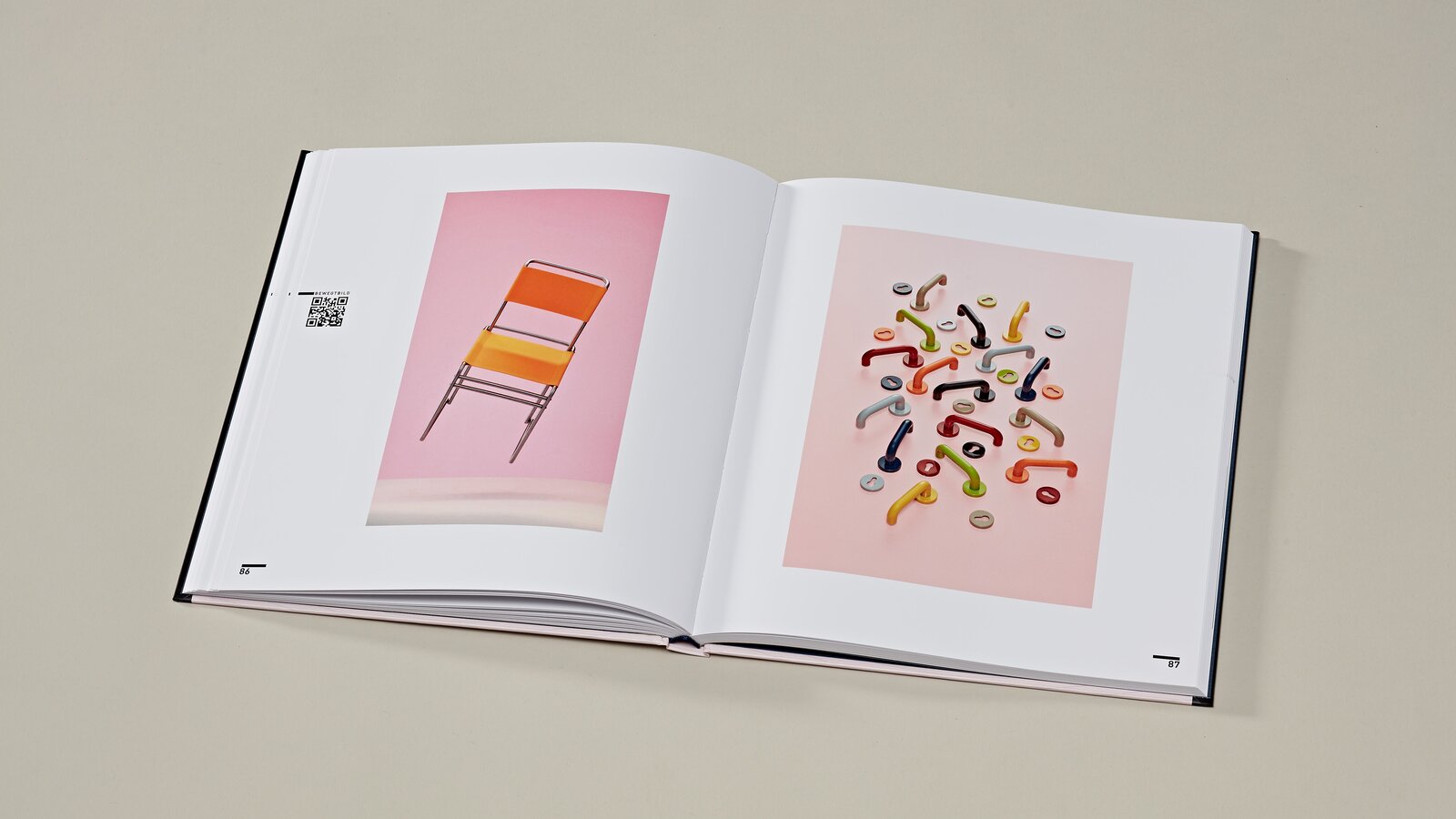 2 open pages of the art book on the Bauhaus exhibition right HEWI lever handle 111 in 8 colours, left orange chair