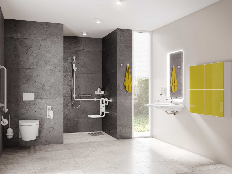 Barrier-free bathroom with washbasin, shower area and WC