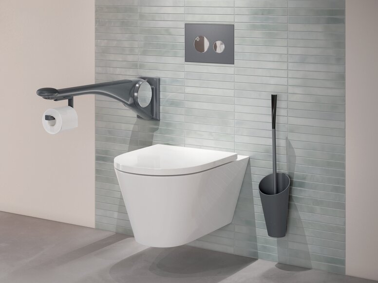 WC equipped with folding support handle and toilet brush in the color anthracite matt