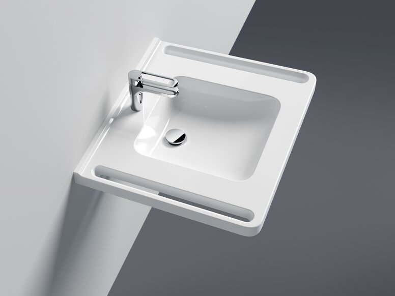 Washbasin with integrated side handles and single-lever tap in chrome