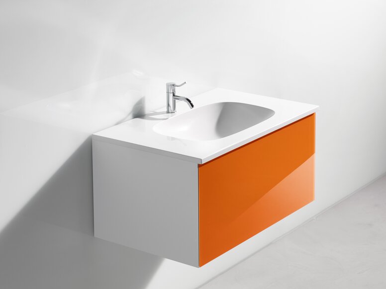 lavabo avec vasque ronde, mitigeur chromé et meuble sous vasque